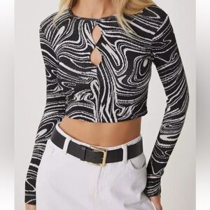 Long sleeve marble design knit top with chest cut out details